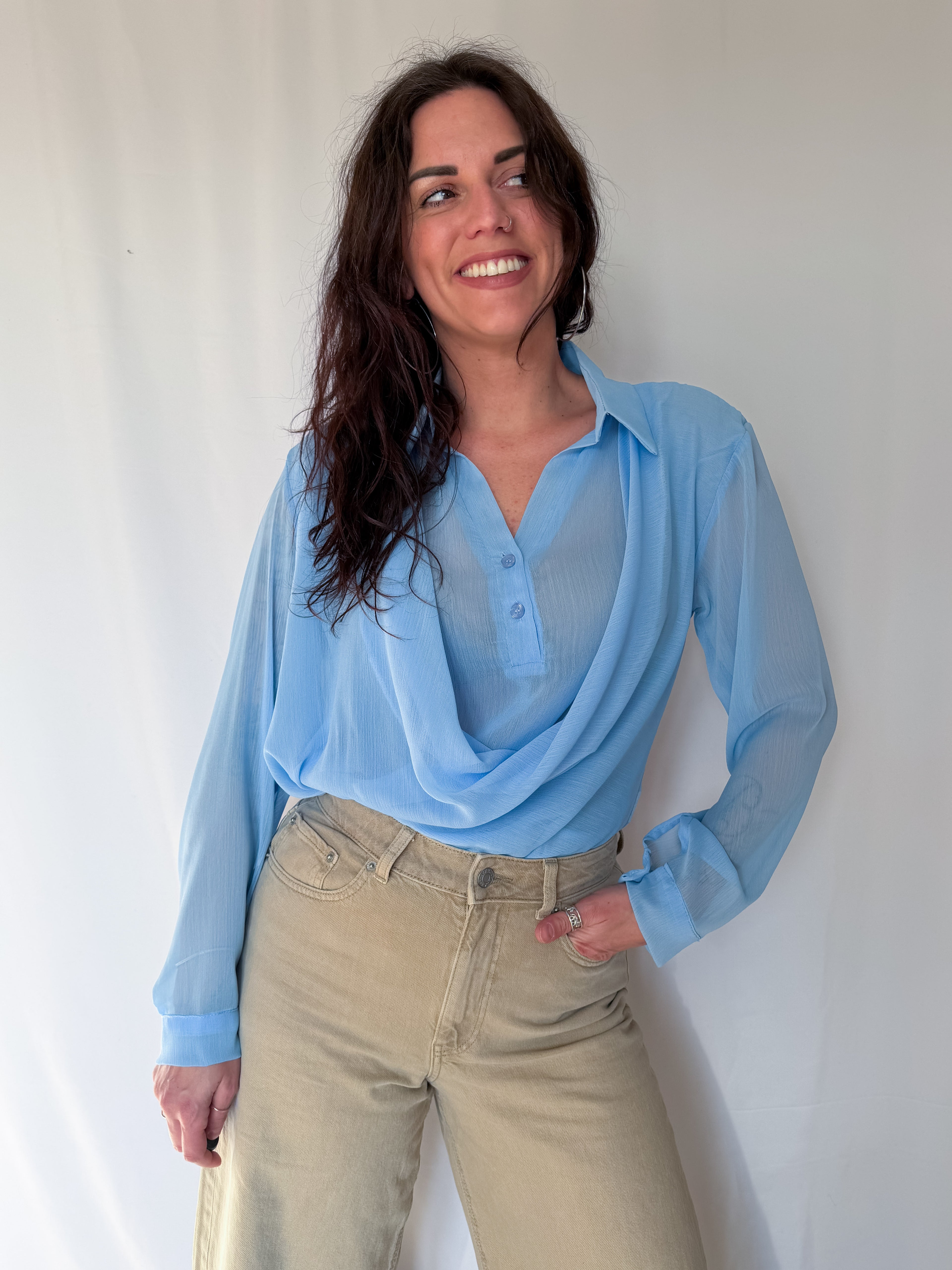 Blusa con drappeggio