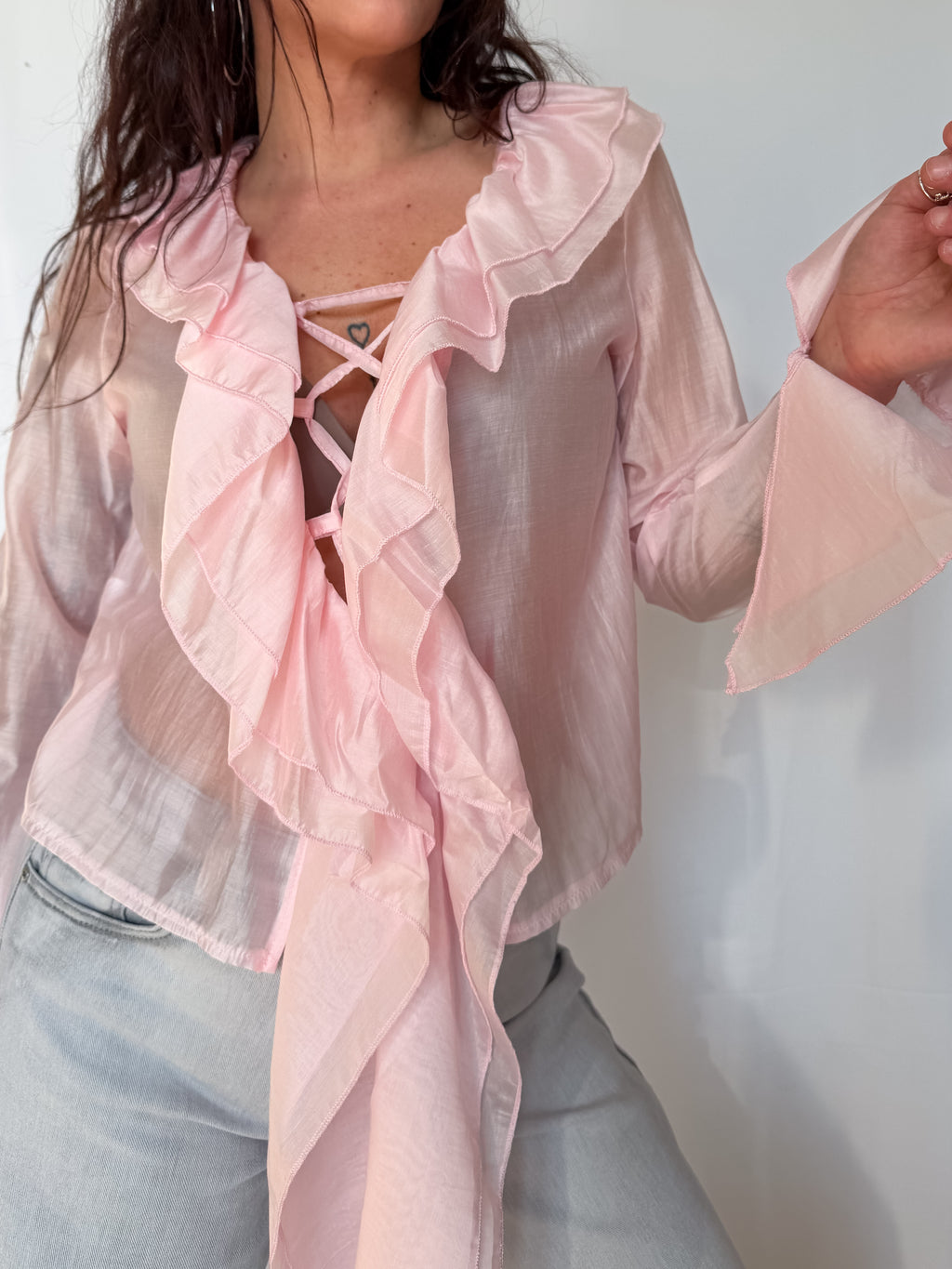 Blusa cropped con rouches