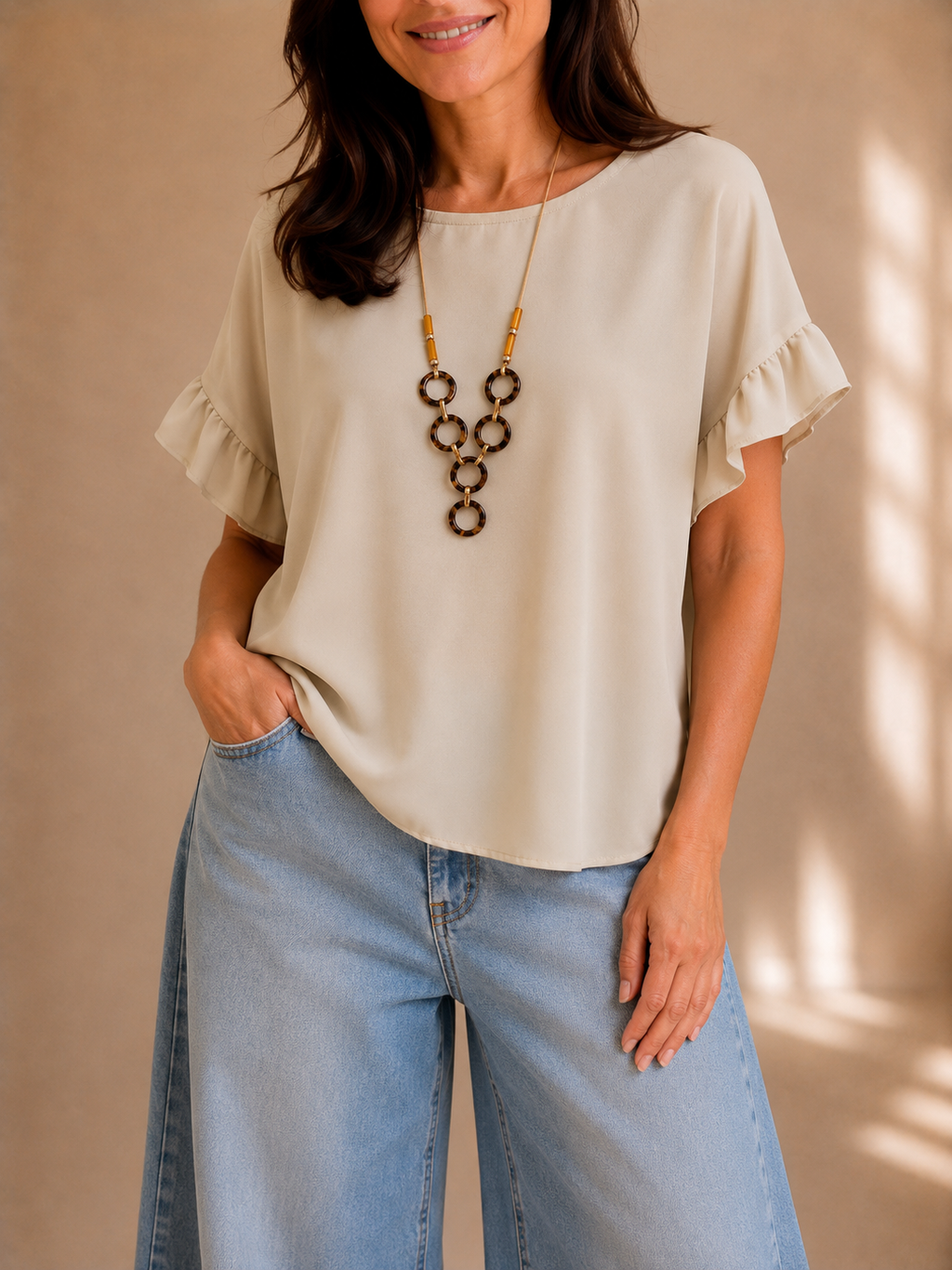 Blusa con manica volant