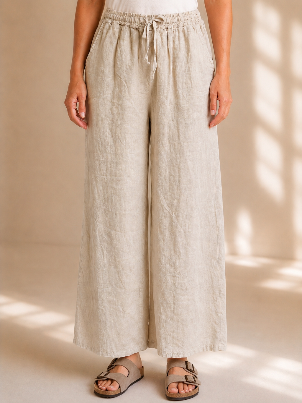 Pantaloni in lino a palazzo