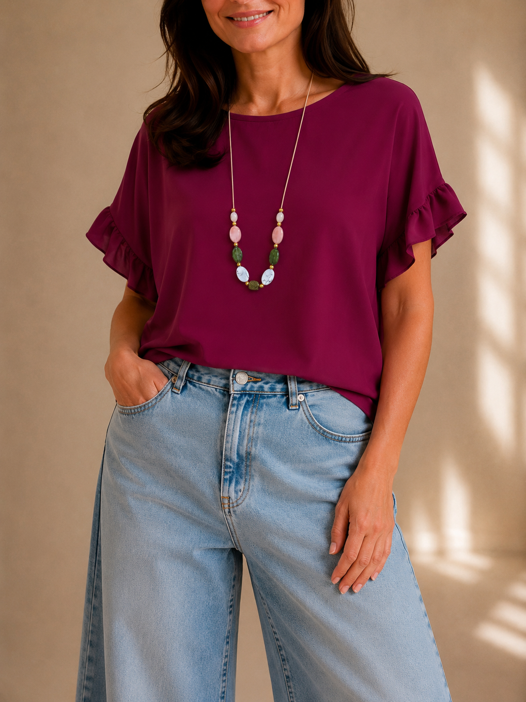 Blusa con manica volant