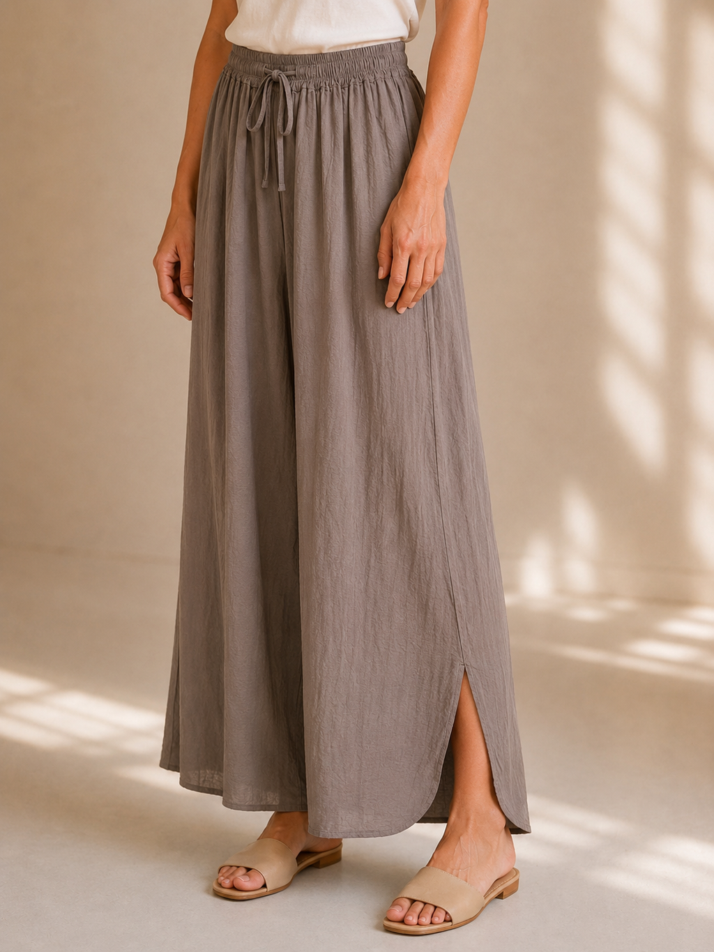 Pantalone palazzo leggero con spacco laterale