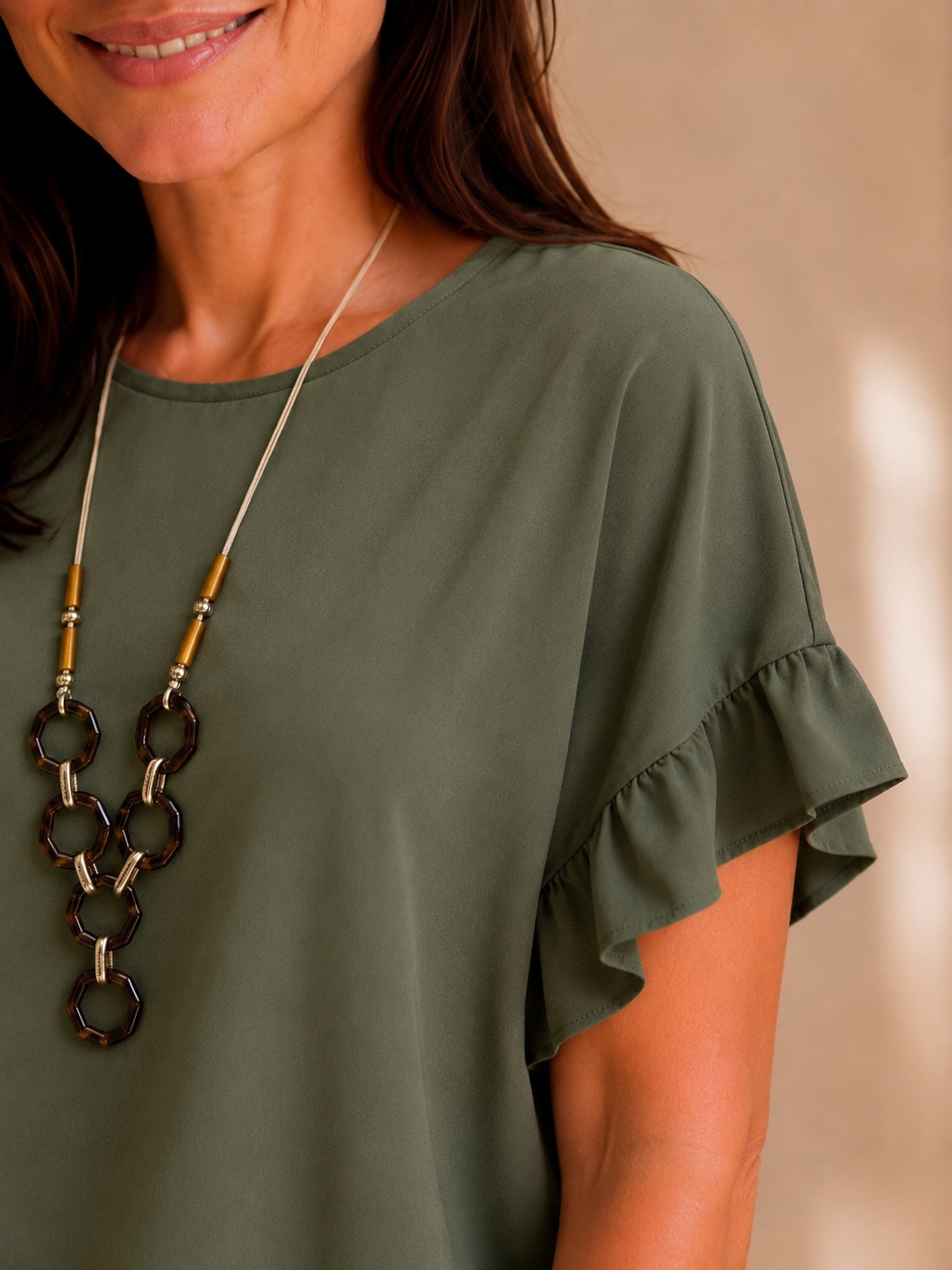 Blusa con manica volant