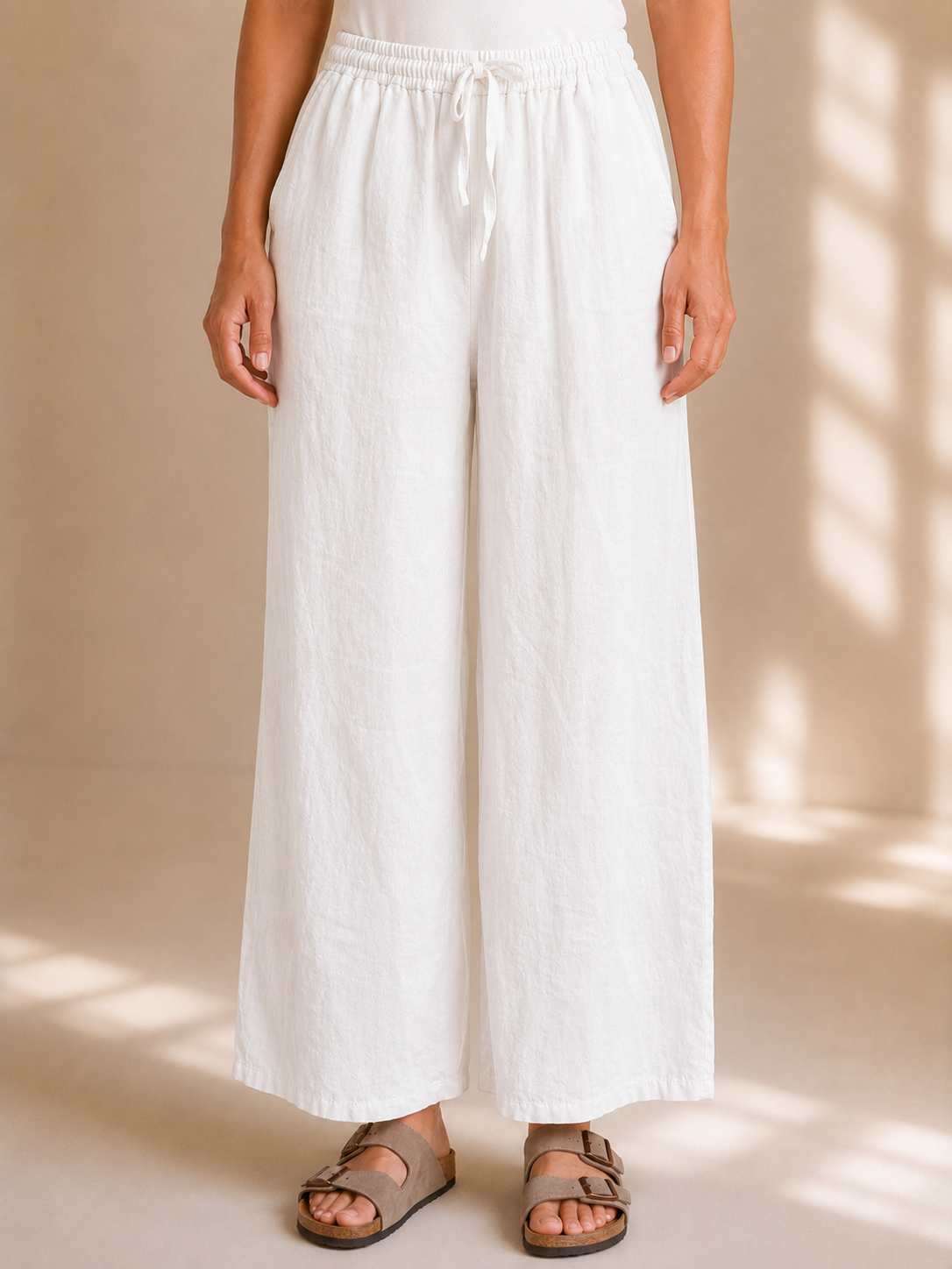 Pantaloni in lino a palazzo