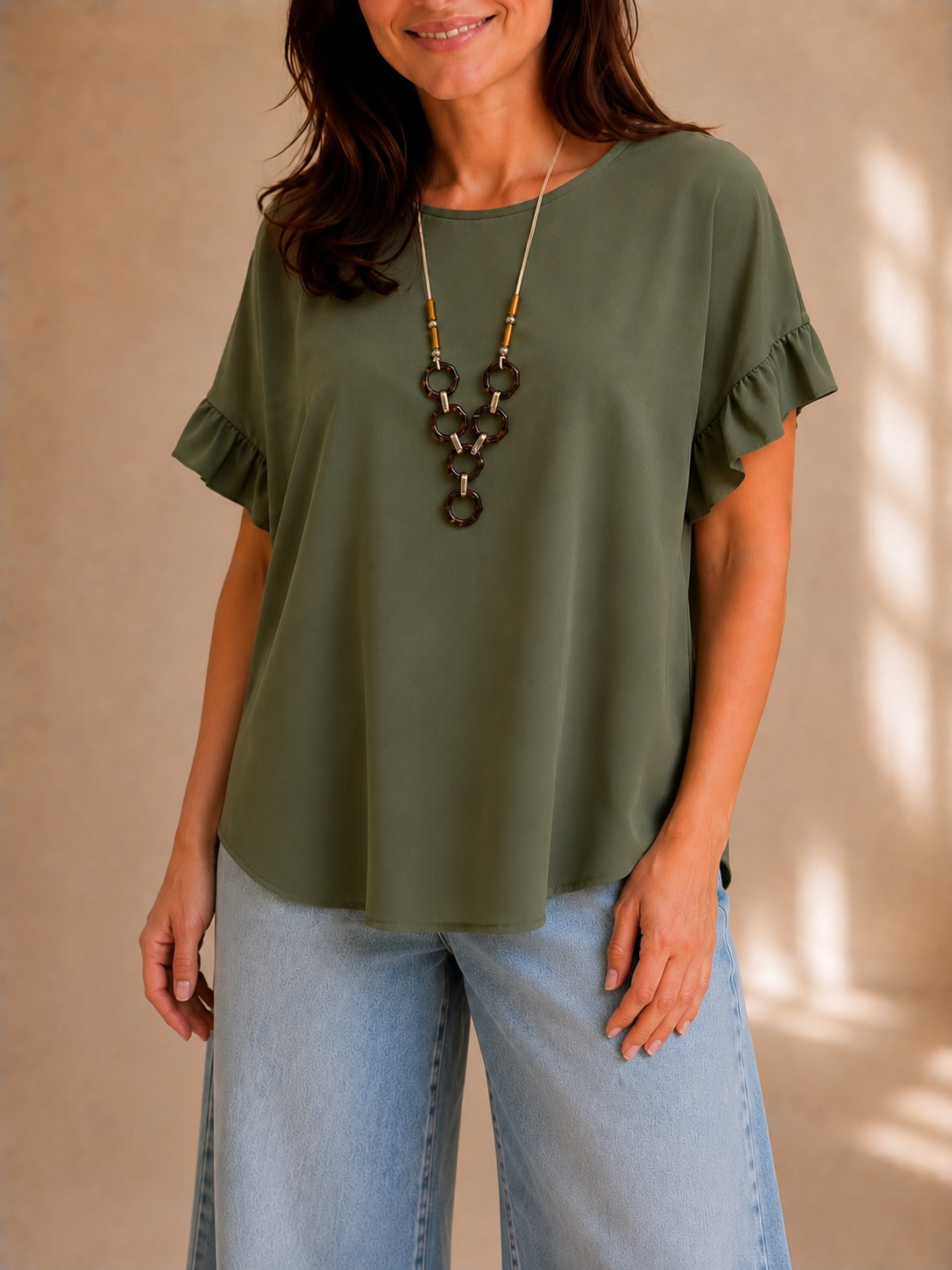 Blusa con manica volant