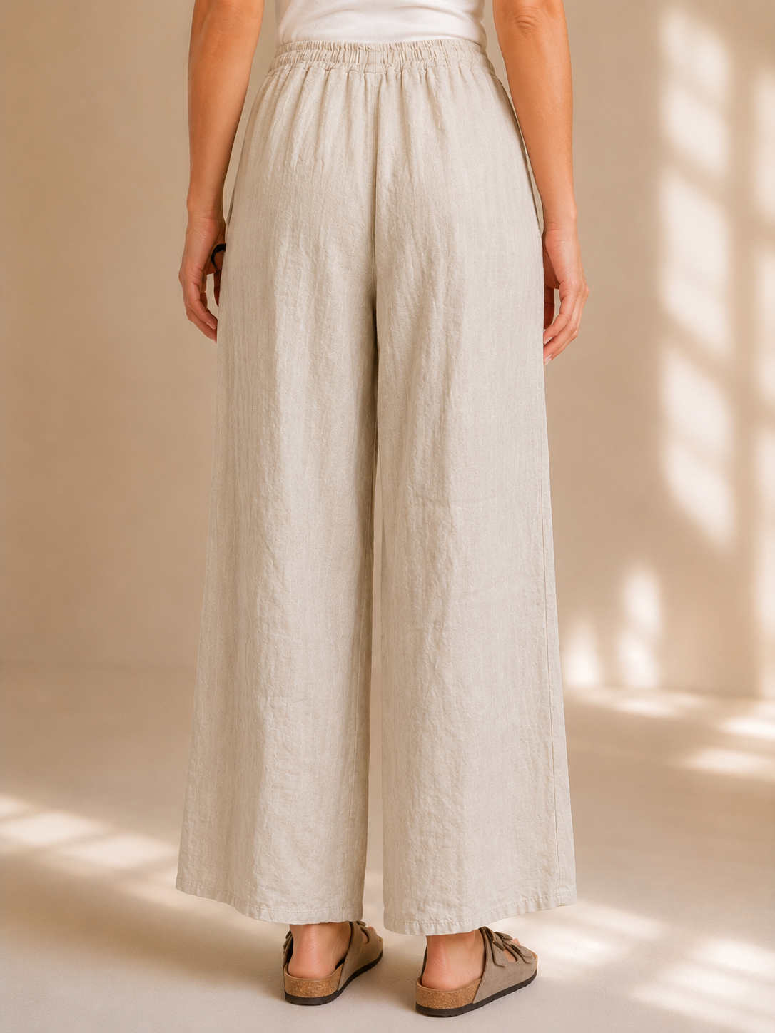 Pantaloni in lino a palazzo