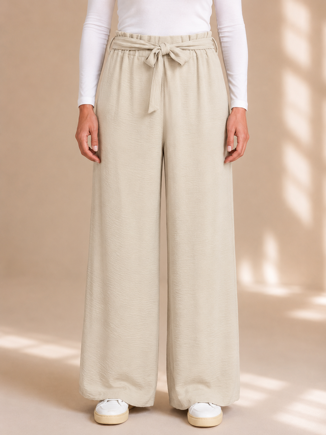 Pantalone a palazzo con fusciacca