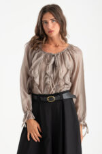 Blusa velata con rouches